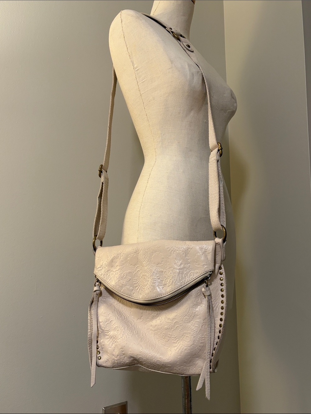 The Sak Cream Embossed Crossbody Bag with Stud Detail
